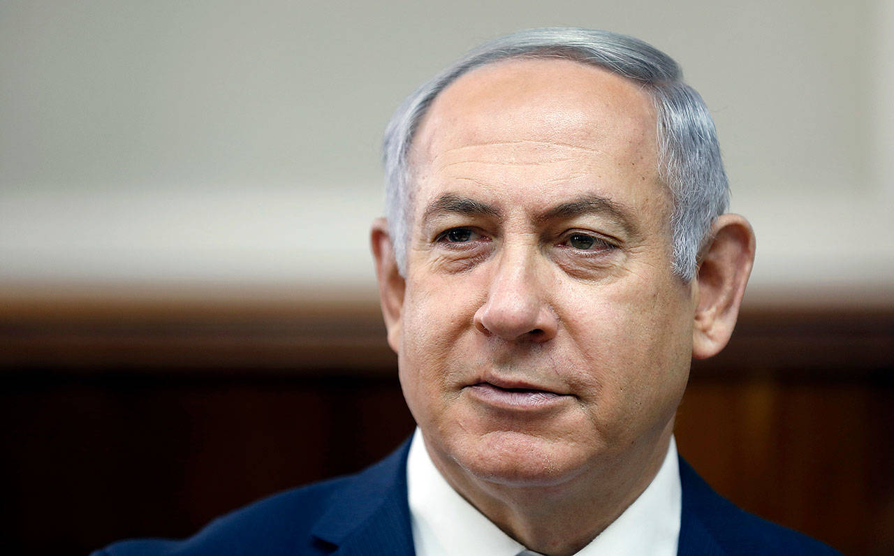 Israeli Prime Minister Benjamin Netanyahu chairs the weekly cabinet meeting at the Prime Minister’s office in Jerusalem on Sunday. (Ronen Zvulun, Pool via AP, File)