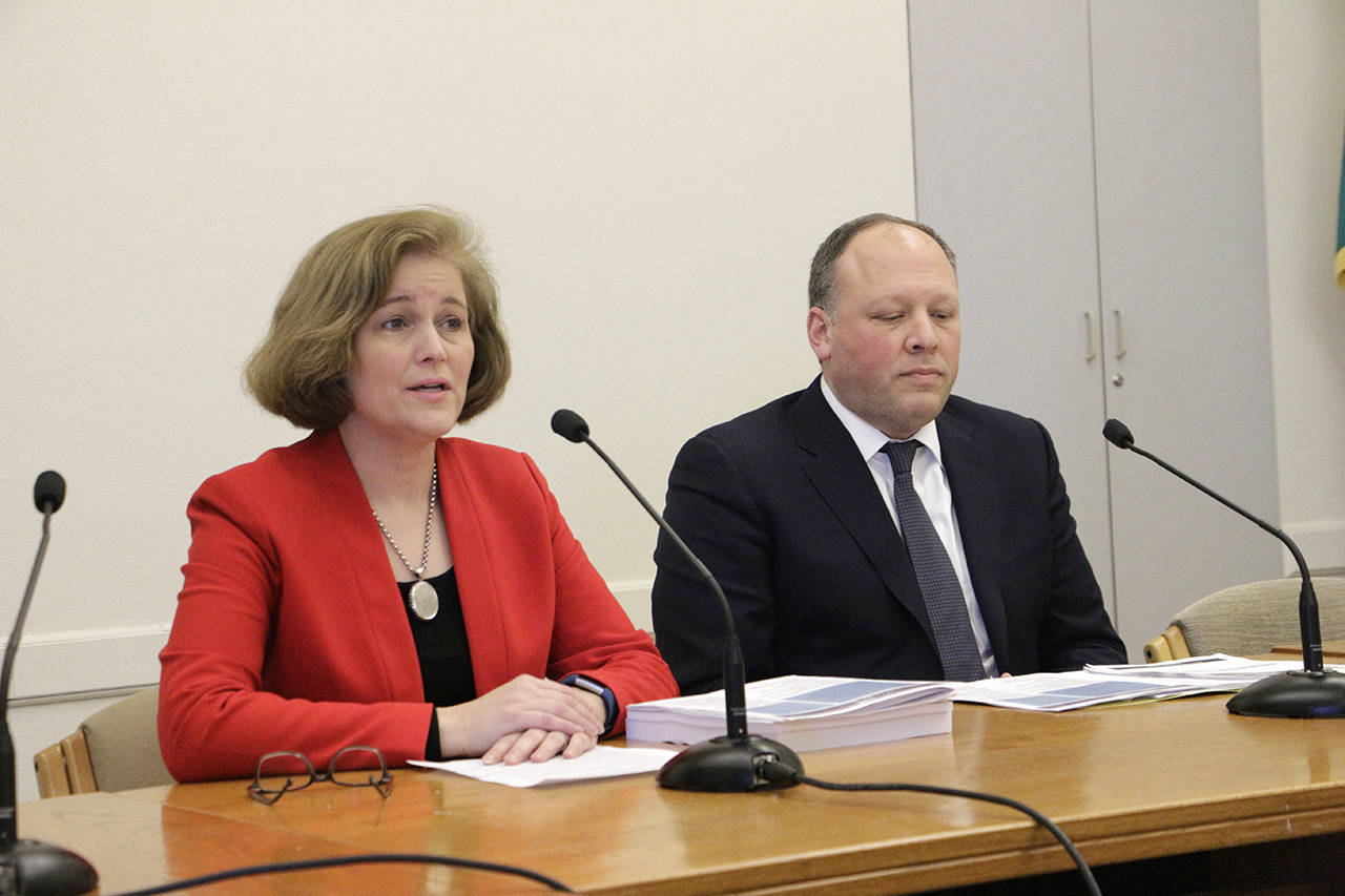 Democratic Sens. Christine Rolfes and David Frockt speak to the media about a supplemental budget proposal in Olympia on Monday. The proposal looks to use a projected state revenue increase to pay for the final component of an education spending plan. (AP Photo/Rachel La Corte)