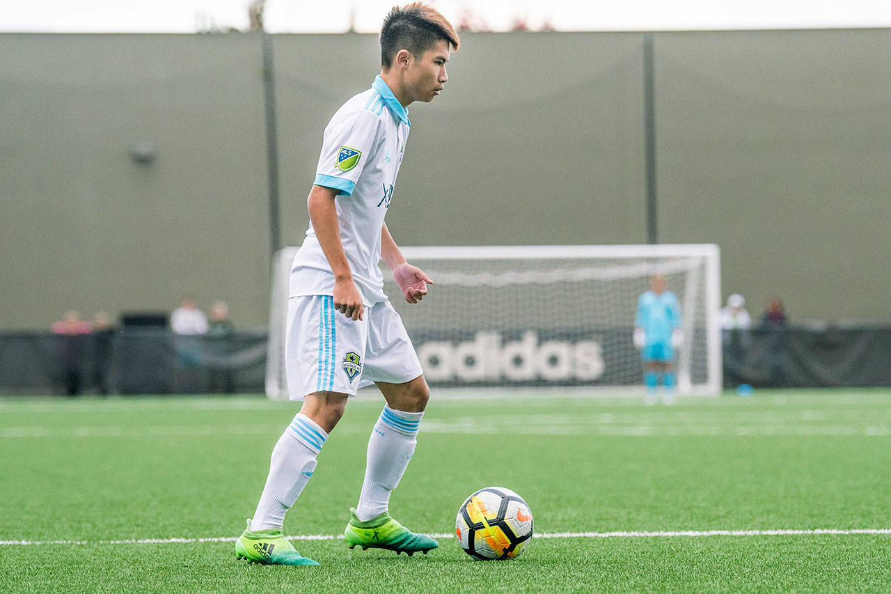 Ben Huynh, a senior at Cascade High School, dribbles with the ball as a member of the Seattle Sounders Academy at Starfire Sports in Tukwila. (Sounders Academy photo).