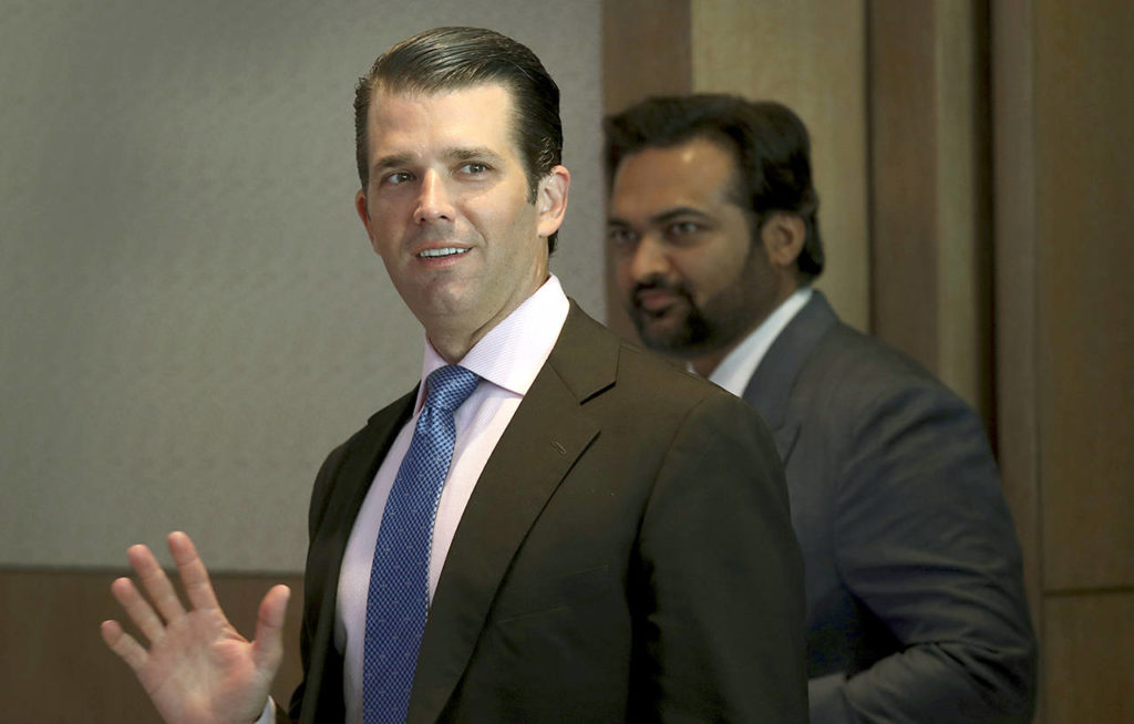 Donald Trump Jr. waves to media as he arrives for a meeting in New Delhi, India, on Tuesday. (AP Photo/Manish Swarup)
