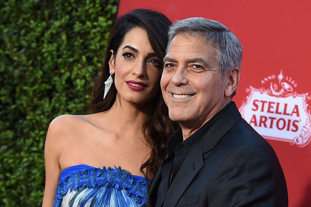 Clooney and George Clooney are donating $500,000 to students organizing nationwide marches against gun violence, and they say they’ll also attend next month’s planned protests. (Photo by Jordan Strauss/Invision/AP, File)
