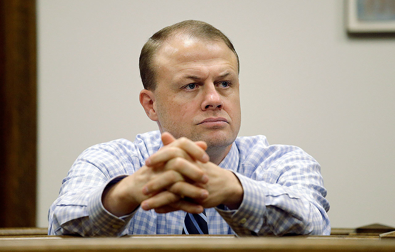 Tim Eyman looks on from the gallery during a hearing regarding one of his initiatives in King County Superior Court, in 2016, in Seattle. Eyman is opposed to legislation this session that would require certain information be provided to the state regarding paid signature gatherers. (Elaine Thompson / Associated Press file photo)