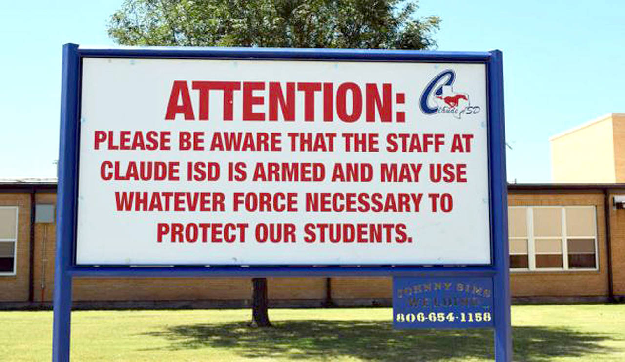 This August 2016 photo shows a sign outside a school in Claude, Texas. (Creede Newton/Amarillo Globe-News via AP, file)