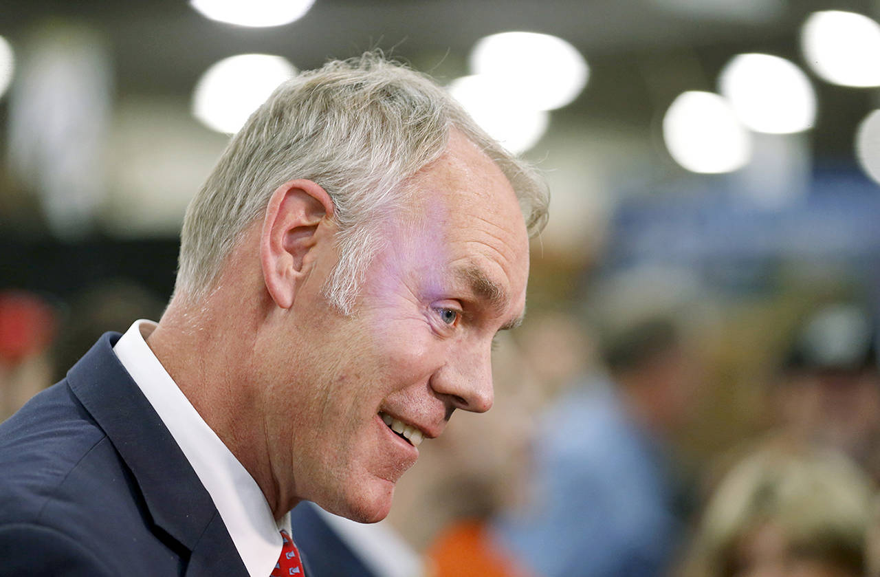 U.S. Interior Secretary Ryan Zinke speaks to reporters at a conservation announcement at the Western Conservation and Hunting Expo in Salt Lake City on Feb. 9. (AP Photo/Rick Bowmer, File)