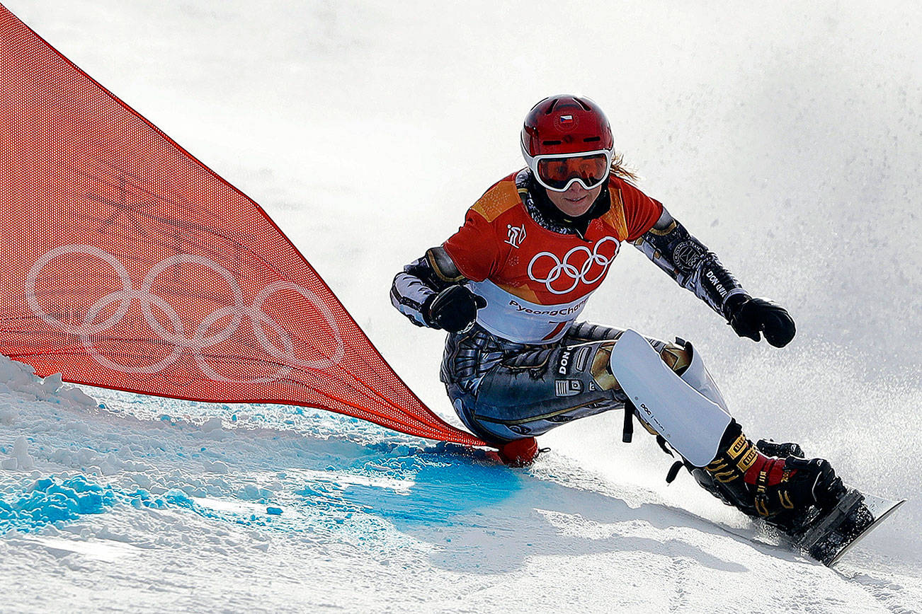 Ledecka adds snowboarding gold to historic haul