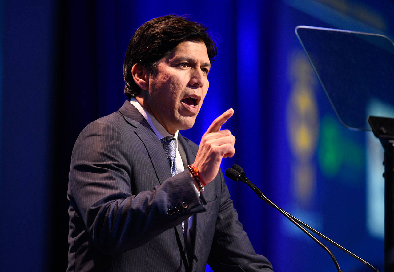 U.S. Senate candidate, Senate President Pro Tem Kevin de Leon, D-Los Angeles, speaks at the 2018 California Democrats State Convention Saturday, Feb. 24, 2018, in San Diego. (AP Photo/Denis Poroy)