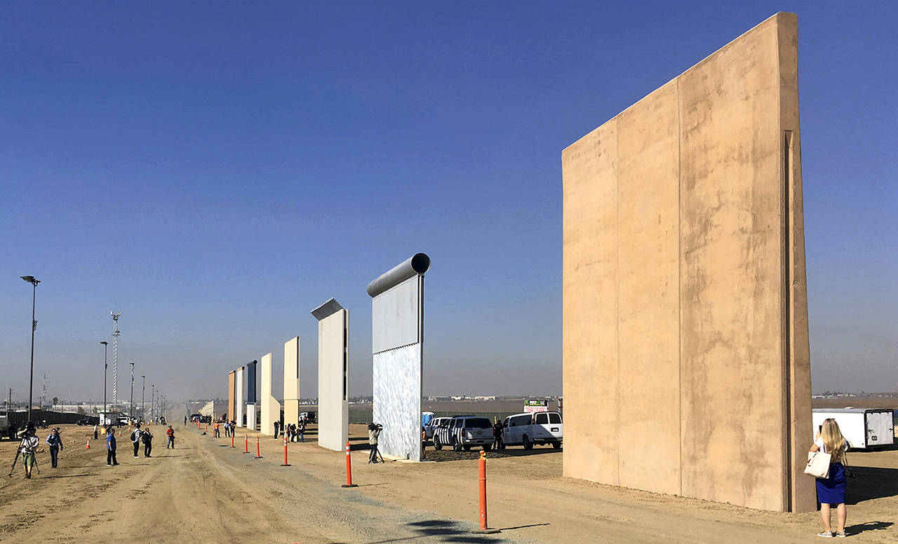 This 2017 photo shows prototypes of border walls in San Diego. (AP Photo/Elliott Spagat, File)