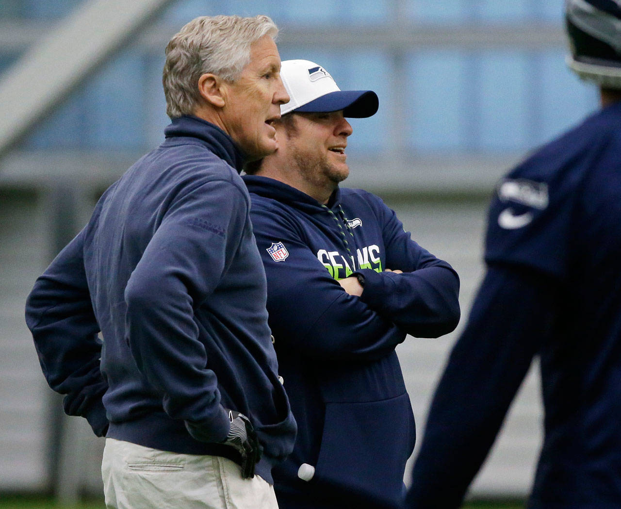 Seahawks head coach Pete Carroll (left) stands with general manager John Schneider (right) during rookie minicamp on May 14, 2017, in Seattle. (AP Photo/Ted S. Warren)