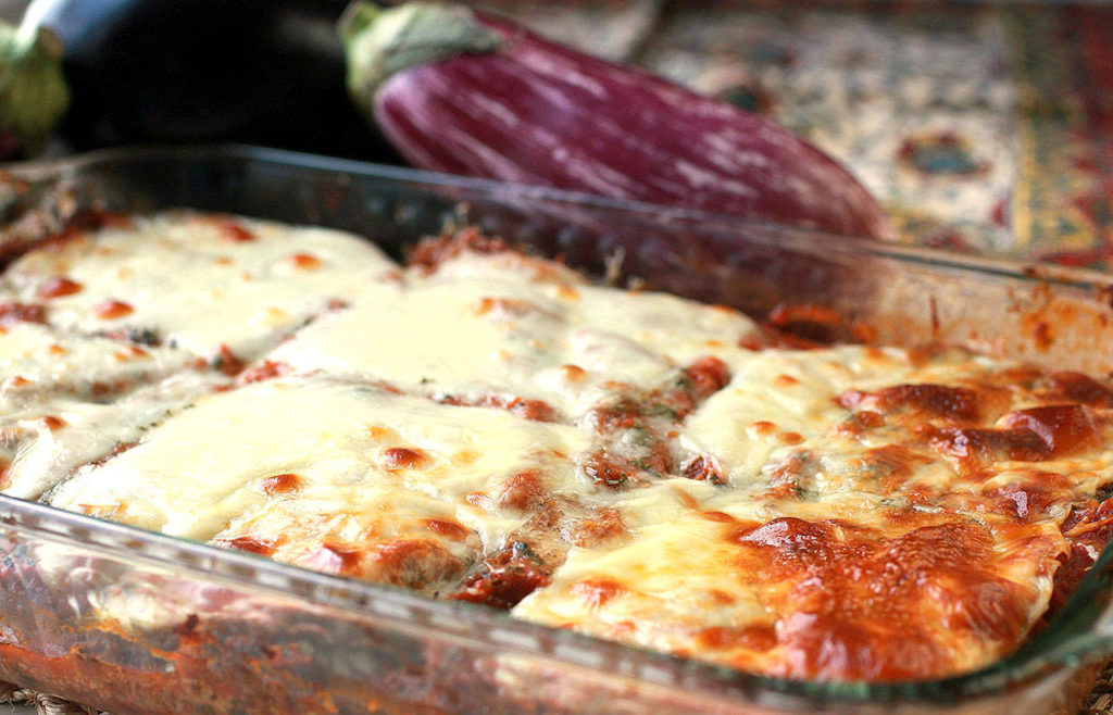 Eggplant parmesan is essentially lasagna that replaces all the noodles with lengthwise-sliced eggplant. (Hillary Levin/St. Louis Post-Dispatch)
