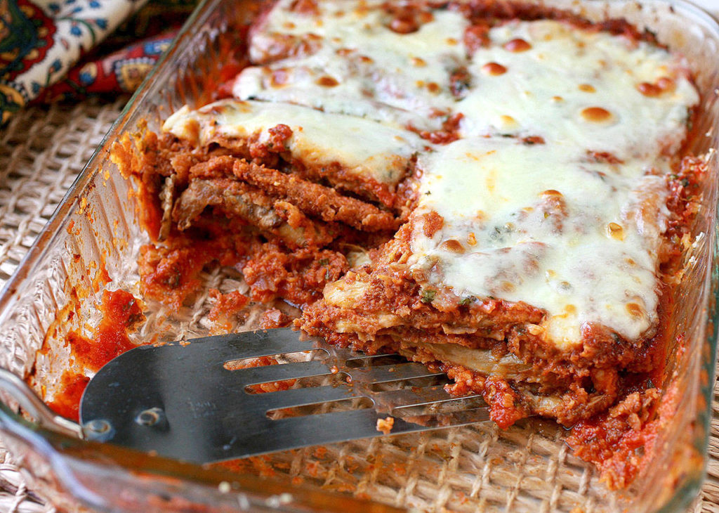 Eggplant parmesan is essentially lasagna that replaces all the noodles with lengthwise-sliced eggplant. (Hillary Levin/St. Louis Post-Dispatch)
