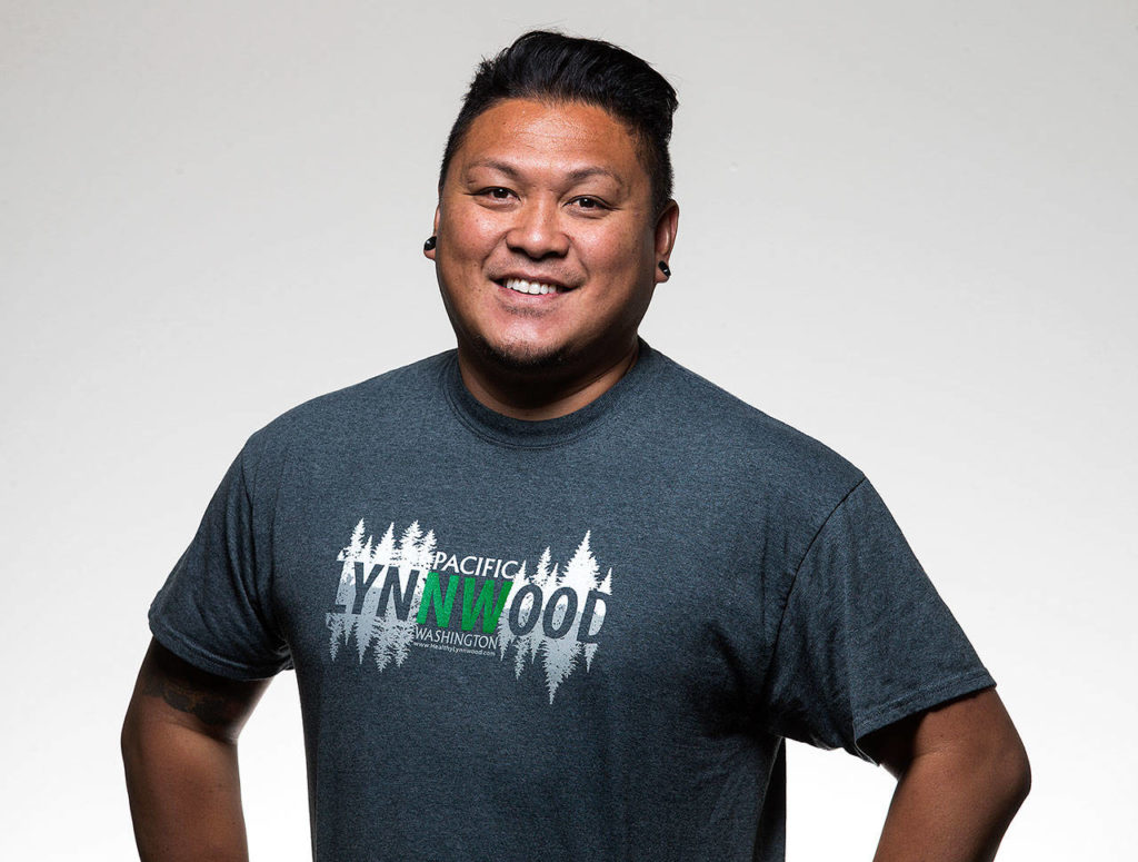 Allan C. Carandang designed the winning Lynnwood T-shirt in a 2017 contest to celebrate what people love about Lynnwood. (Andy Bronson / The Herald)
