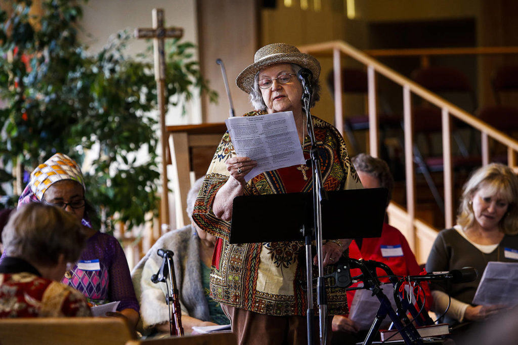 Patricia Beaudry reads a passage written by women in the South American country Suriname about their daily lives during a ceremony held at Edmonds United Methodist Church in celebration of the World Day of Prayer on March 2. (Ian Terry / The Herald)
