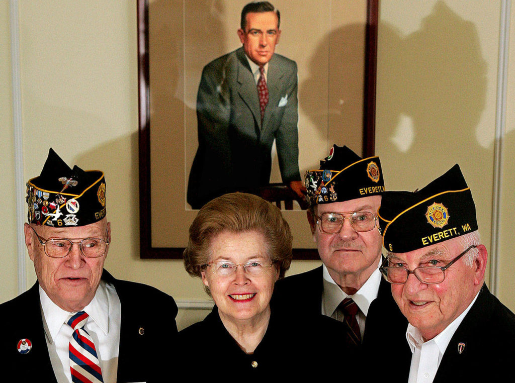 Legionnaires George Brown, (left) Jim DeMonbrun and Kal Leichtman join with Helen Jackson at the Jackson home to celebrate the renaming of Everett’s American Legion Post No. 6 in honor of the late Sen. Henry M. Jackson. (Herald file / Michael O’Leary)
