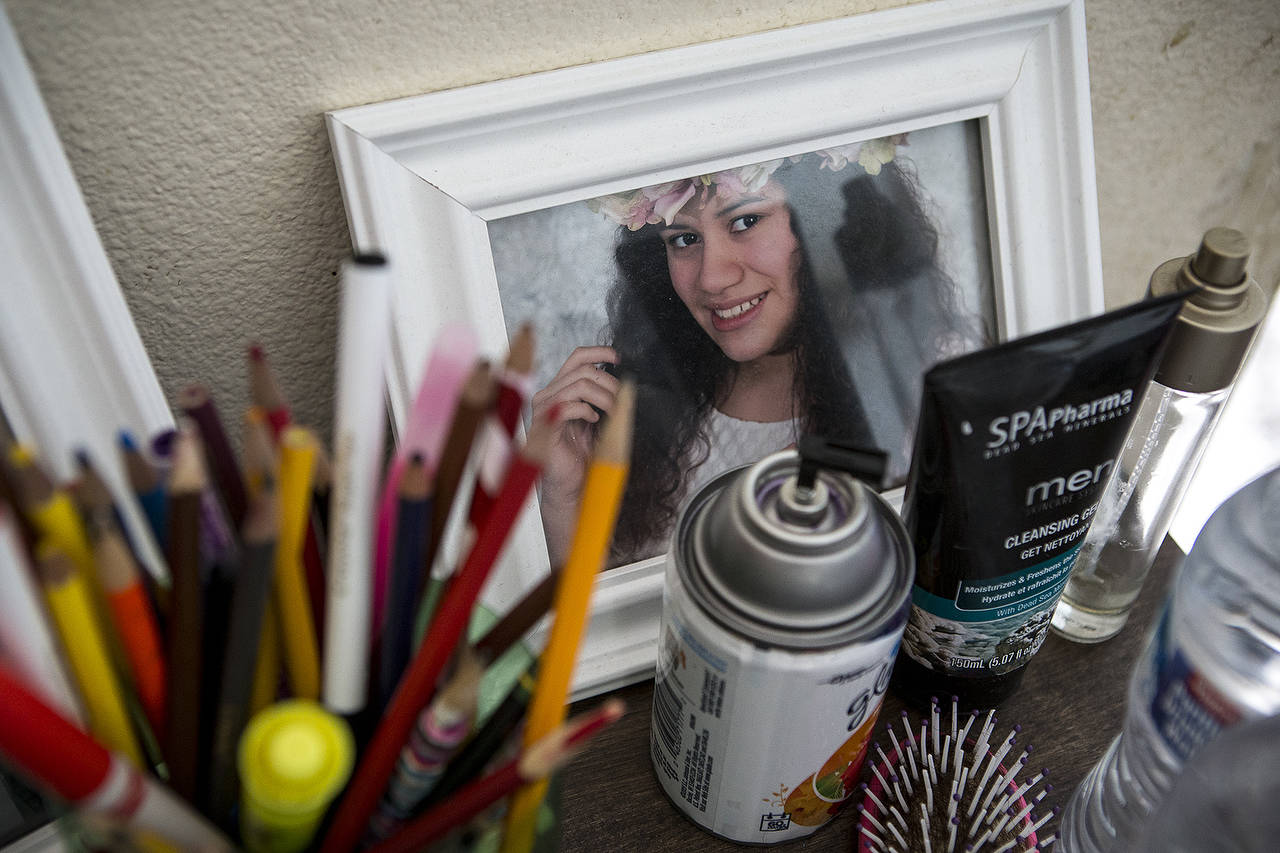 A picture of Bernarda Pineda’s oldest daughter, Sherly, now 14, sits on a dresser at their home in Marysville. (Ian Terry / The Herald)