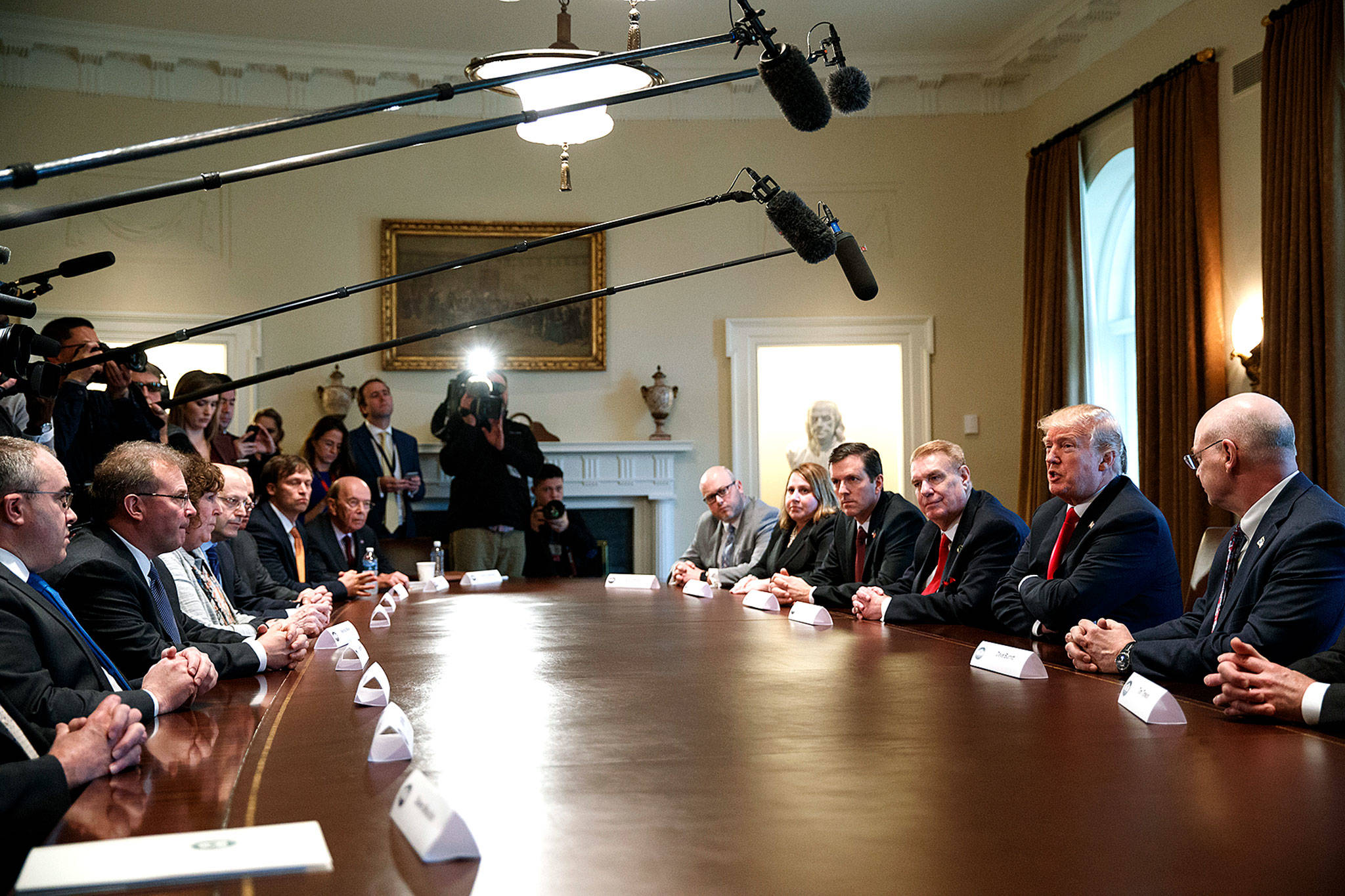 President Donald Trump speaks during a meeting with steel and aluminum executives in the Cabinet Room of the White House on Thursday in Washington. (AP Photo/Evan Vucci)