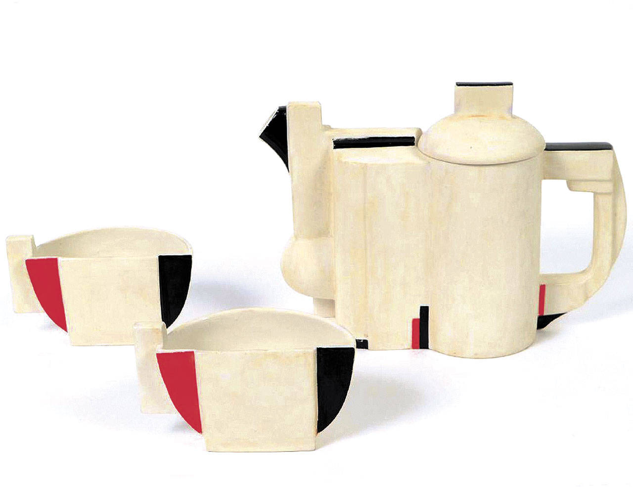 This group of porcelains, a teapot and two cups, was made in Russia in 1923 in the “Supremist” style. It did not attract any bidders at a Florida auction early this year, even though it is a good example of a special style. (Cowles Syndicate Inc.)