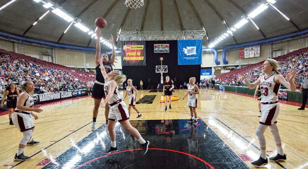 Archbishop Murphy’s Julia Lucas (20) scores over W.F. West’s Annika Waring (33) in the 2A girls Hardwood Classic championship game on March 3, 2018, at the Yakima Valley SunDome. W.F. West defeated Archbishop Murphy 64-52. (TJ Mullinax / For The Herald)
