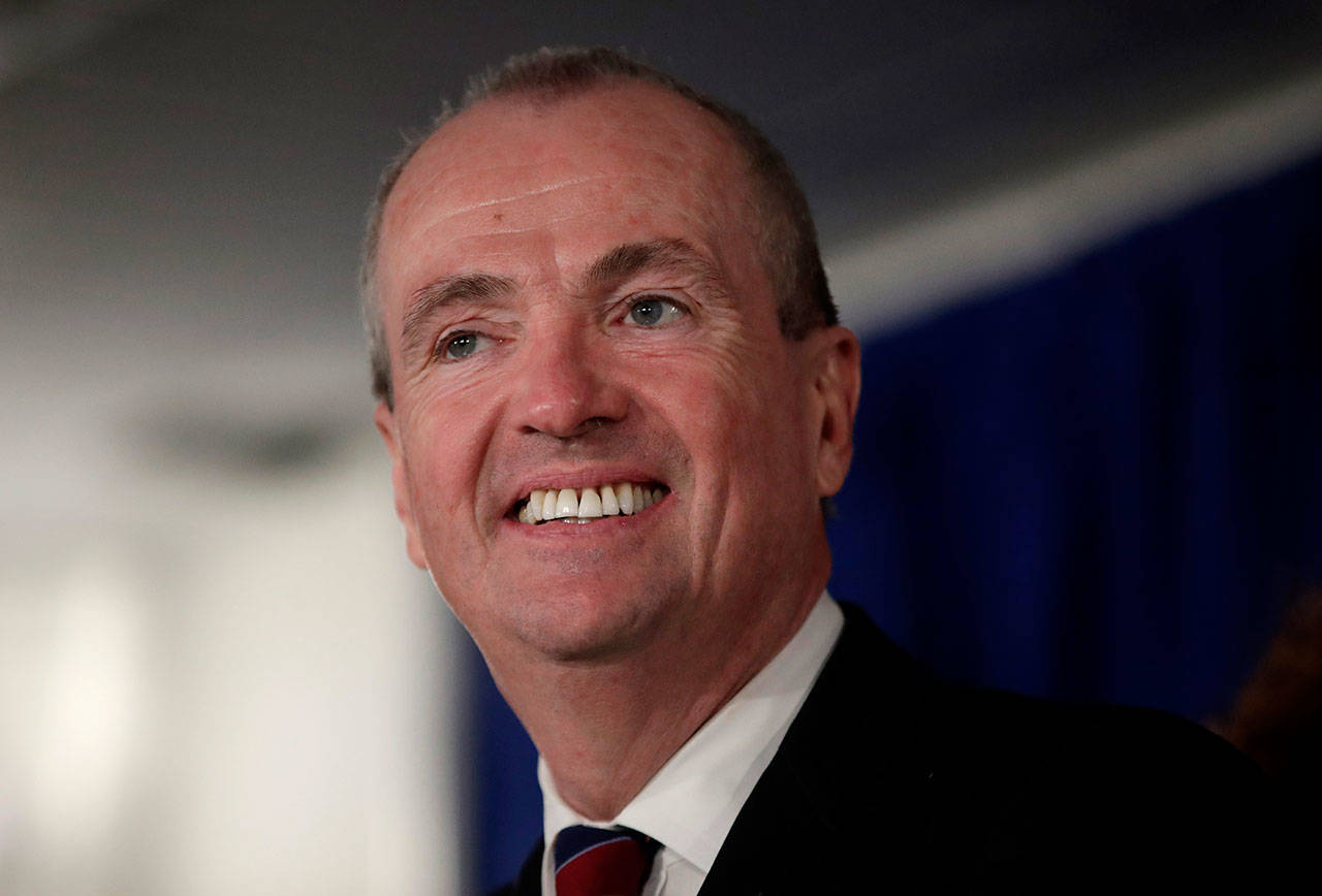 New Jersey Gov. Phil Murphy speaks before signing the first executive order of his administration Jan. 18, in Trenton, N.J. Democratic officials in some high-tax states are pushing legislation that would retain a federal tax break for state and local taxes, a deduction that was capped in the recent GOP tax overhaul. Murphy’s office describes the push for a work-around to the new cap on local taxes as a matter of fairness, especially if many of the federal tax breaks expire as scheduled in 2027. (AP Photo/Julio Cortez, File)