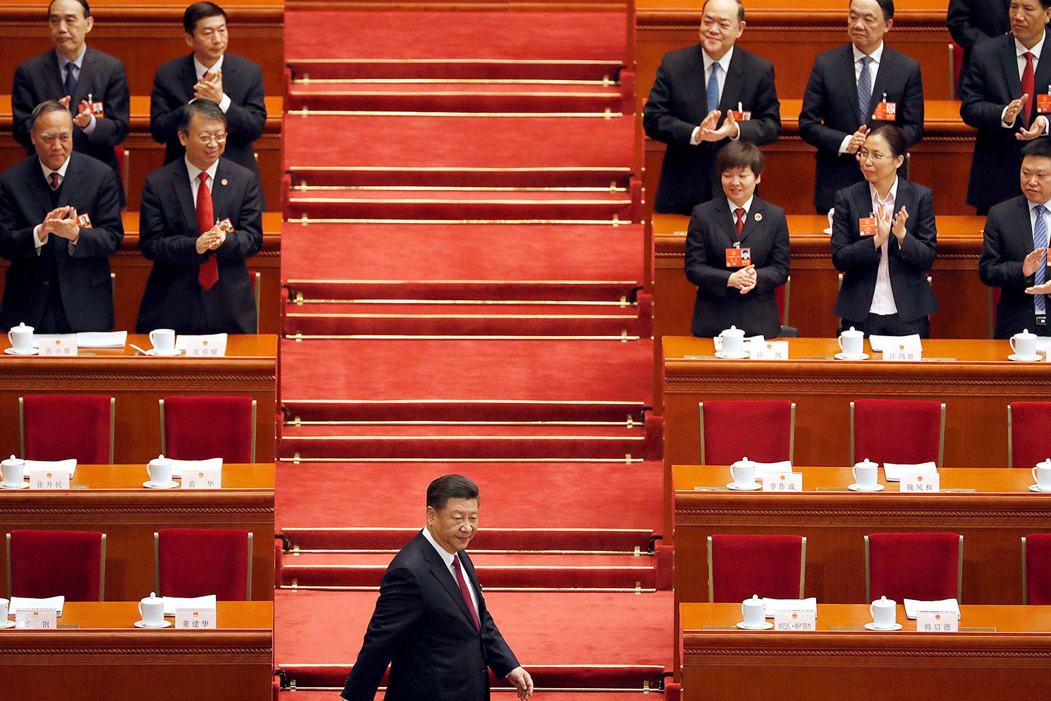 Chinese President Xi Jinping arrives for the opening session of the annual National People’s Congress in Beijing’s Great Hall of the People on Monday. (AP Photo/Ng Han Guan)