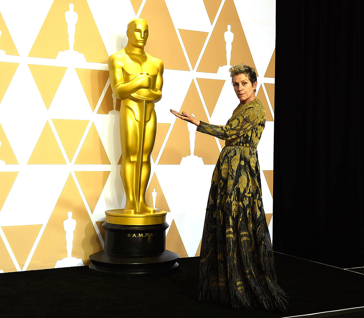 Frances McDormand, winner of the award for best performance by an actress in a leading role for “Three Billboards Outside Ebbing, Missouri,” poses in the press room at the Oscars on Sunday at the Dolby Theatre in Los Angeles. (Photo by Jordan Strauss/Invision/AP)