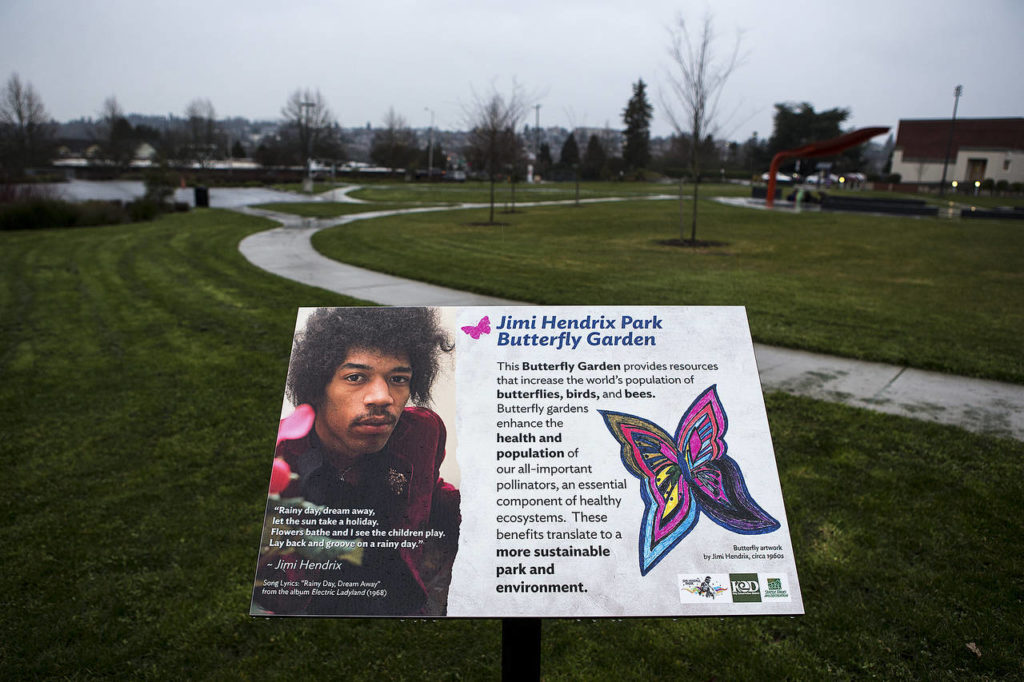 A sign informs visitors to Jimi Hendrix Park of a butterfly garden. Butterflies figure prominently in Hendrix’s song “Little Wing.” (Ian Terry / The Herald)
