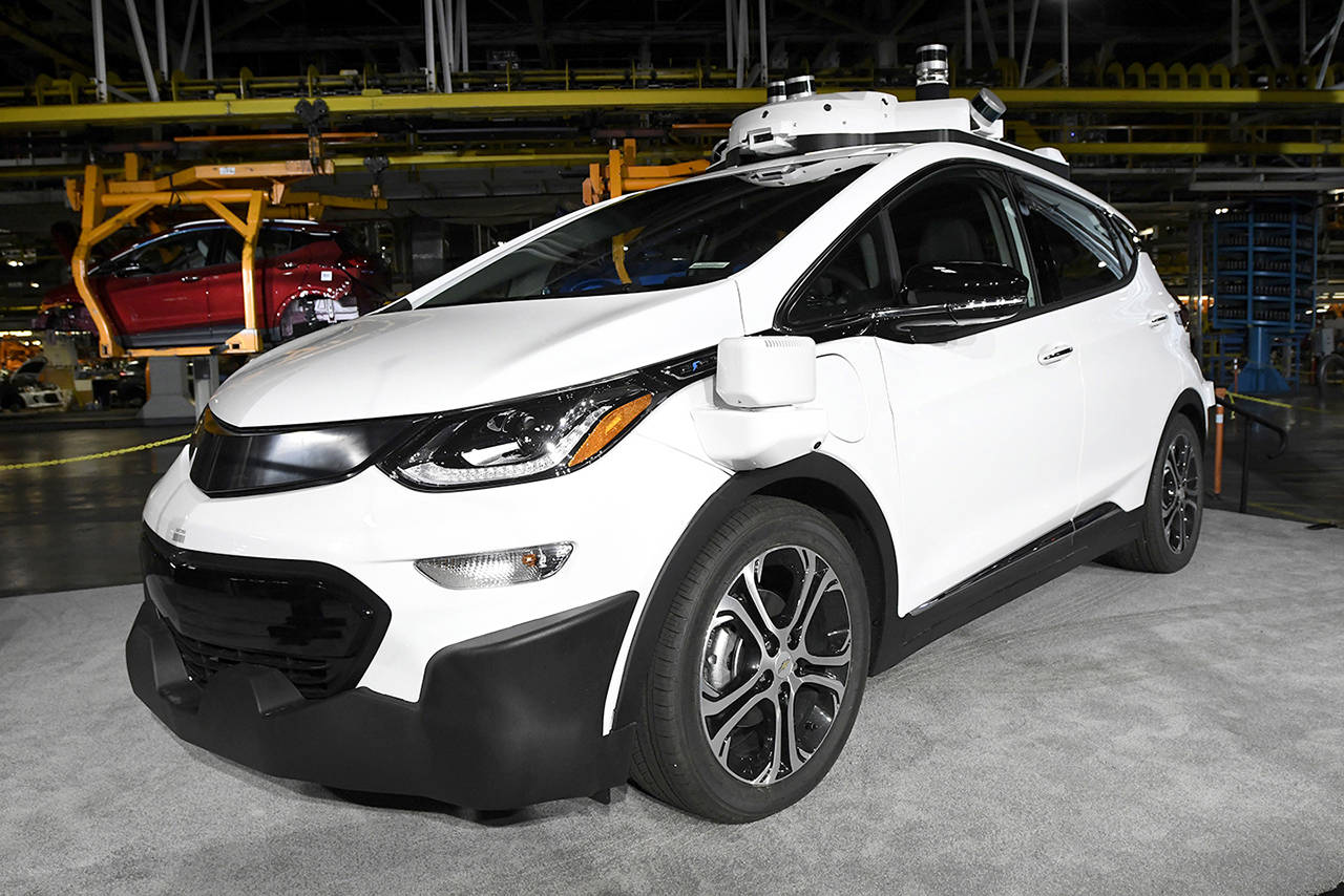 A self-driving Chevrolet Bolt EV that is in General Motors Co.’s autonomous vehicle development program appears on display at GM’s Orion Assembly in Lake Orion, Michigan. (Jose Juarez/Detroit News via AP, File)