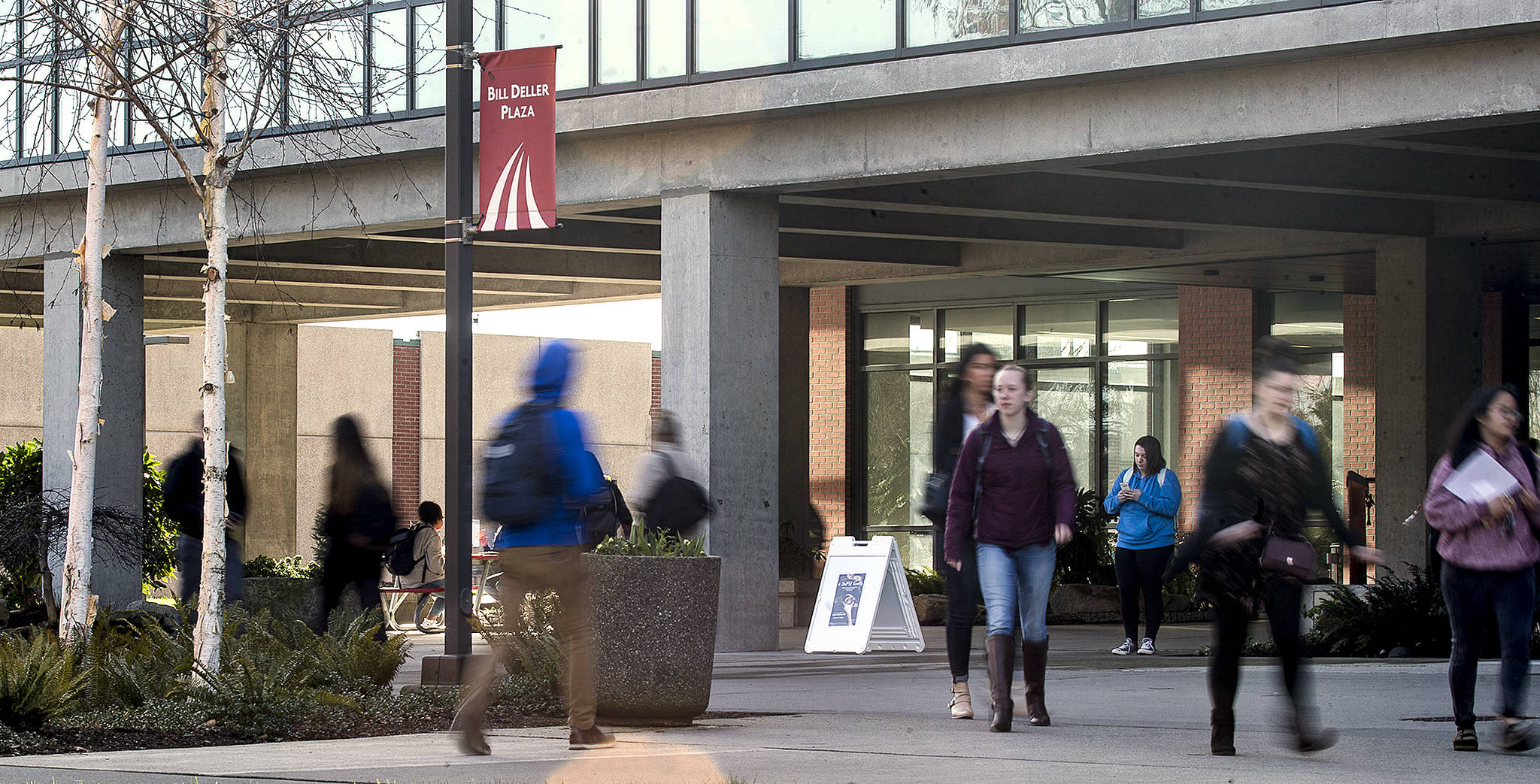 Students walk on the Everett Community College campus on Wednesday. From fall 2014 to fall 2016, the county’s unemployment fell .8 percent. At EvCC, the head count of students declined by 2.7 percent during that time. (Ian Terry / The Herald)