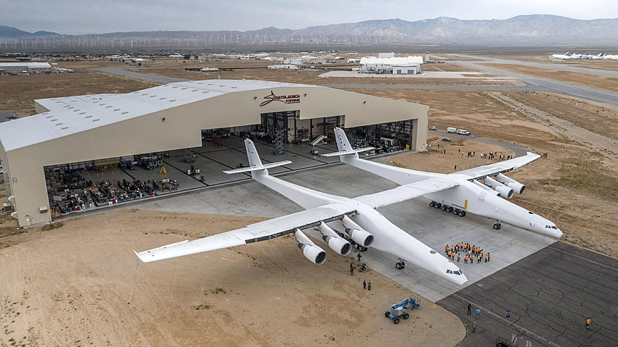 Paul Allen’s Stratolaunch airplane emerges from its hangar in Mojave, California. (Stratolaunch Systems Corp.)