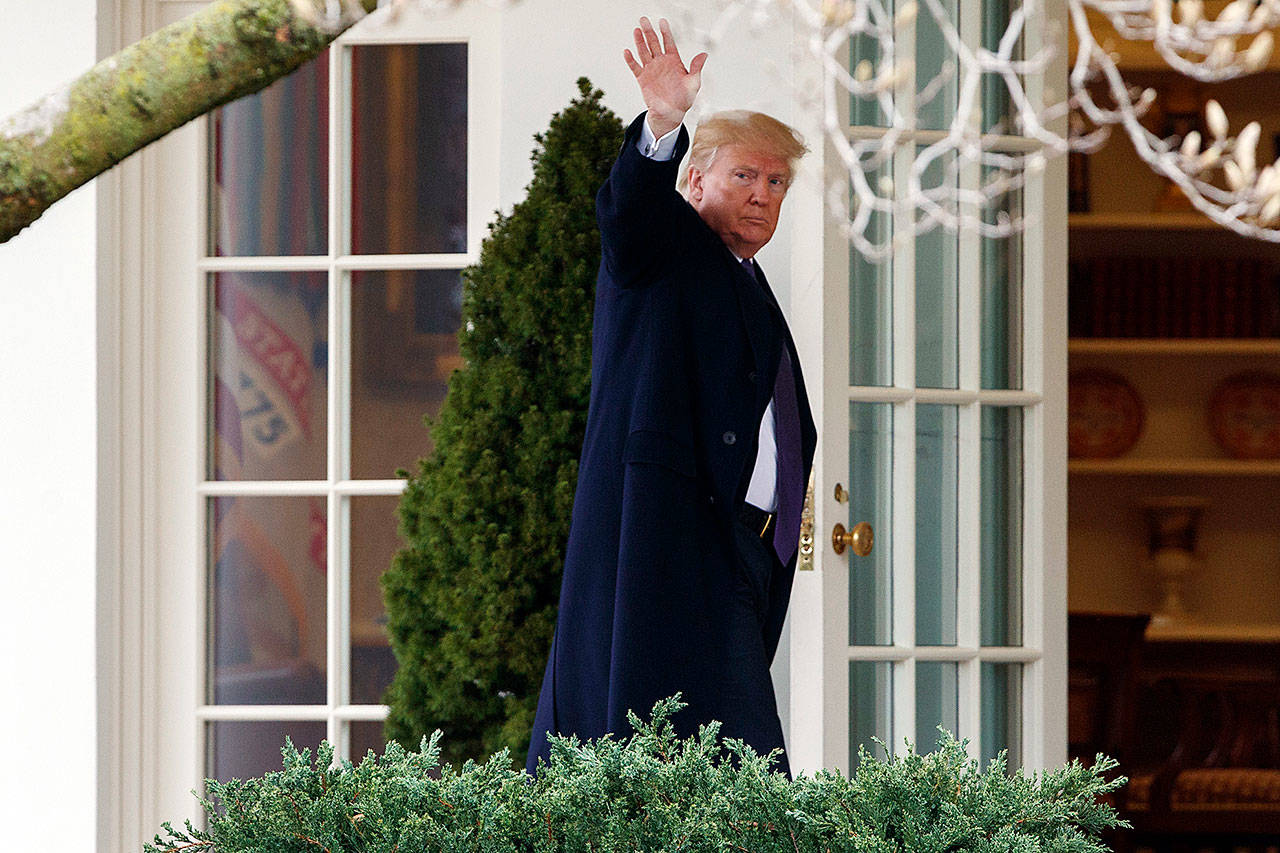 President Donald Trump walks to the Oval Office on Wednesday in Washington. (AP Photo/Evan Vucci)