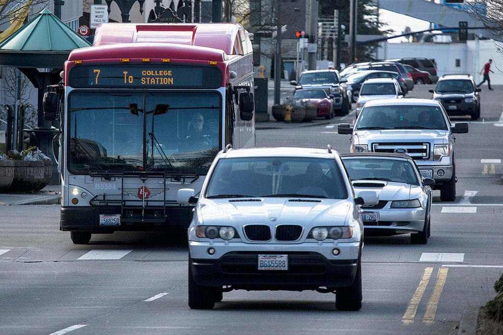 A route 7 Everett Transit bus drives up Hewitt Avenue in downtown Everett on Friday. (Ian Terry / The Herald)
