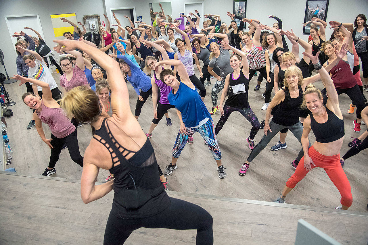 Jazzercise President Shanna Missett Nelson, daughter of the CEO and founder, teaches a class at a newly opened center in Spokane. (Dan Pelle / The Spokesman-Review)