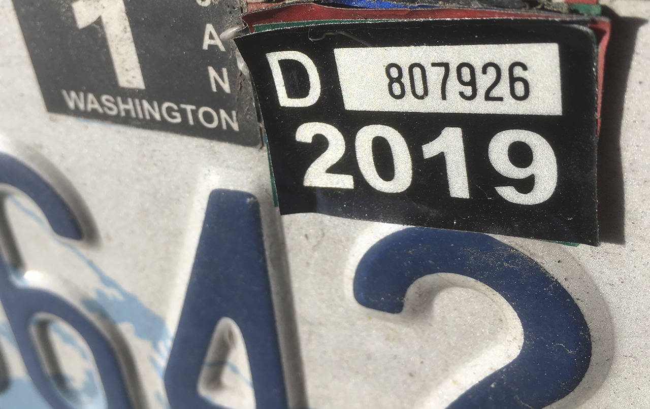 Lawmakers ran out of time to vote on a car tab fee bill. (Herald file)