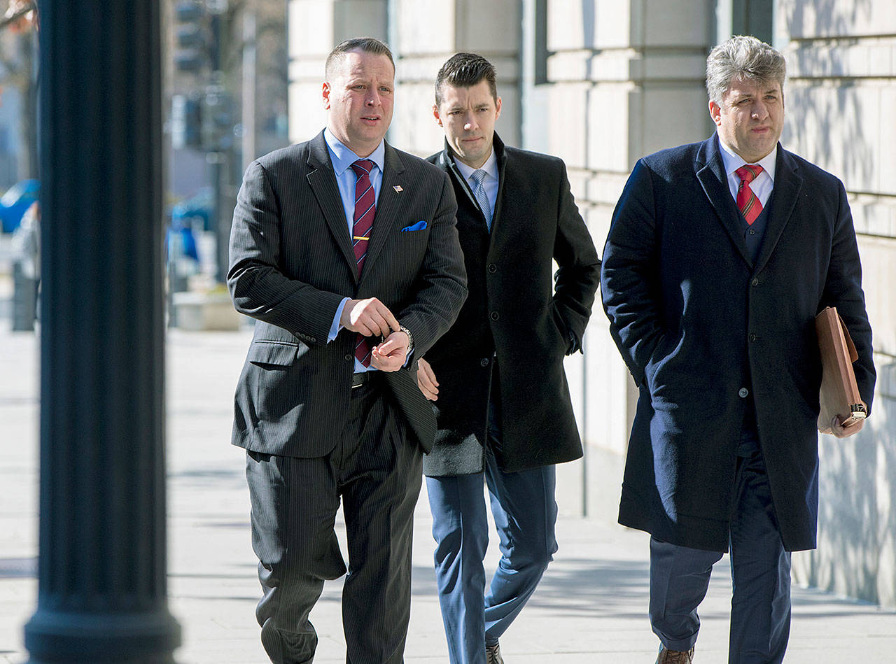 Former Trump campaign aide Sam Nunberg (left) arrives at the U.S. District Courthouse to appear before a grand jury on Friday in Washington. (AP Photo/J. Scott Applewhite)