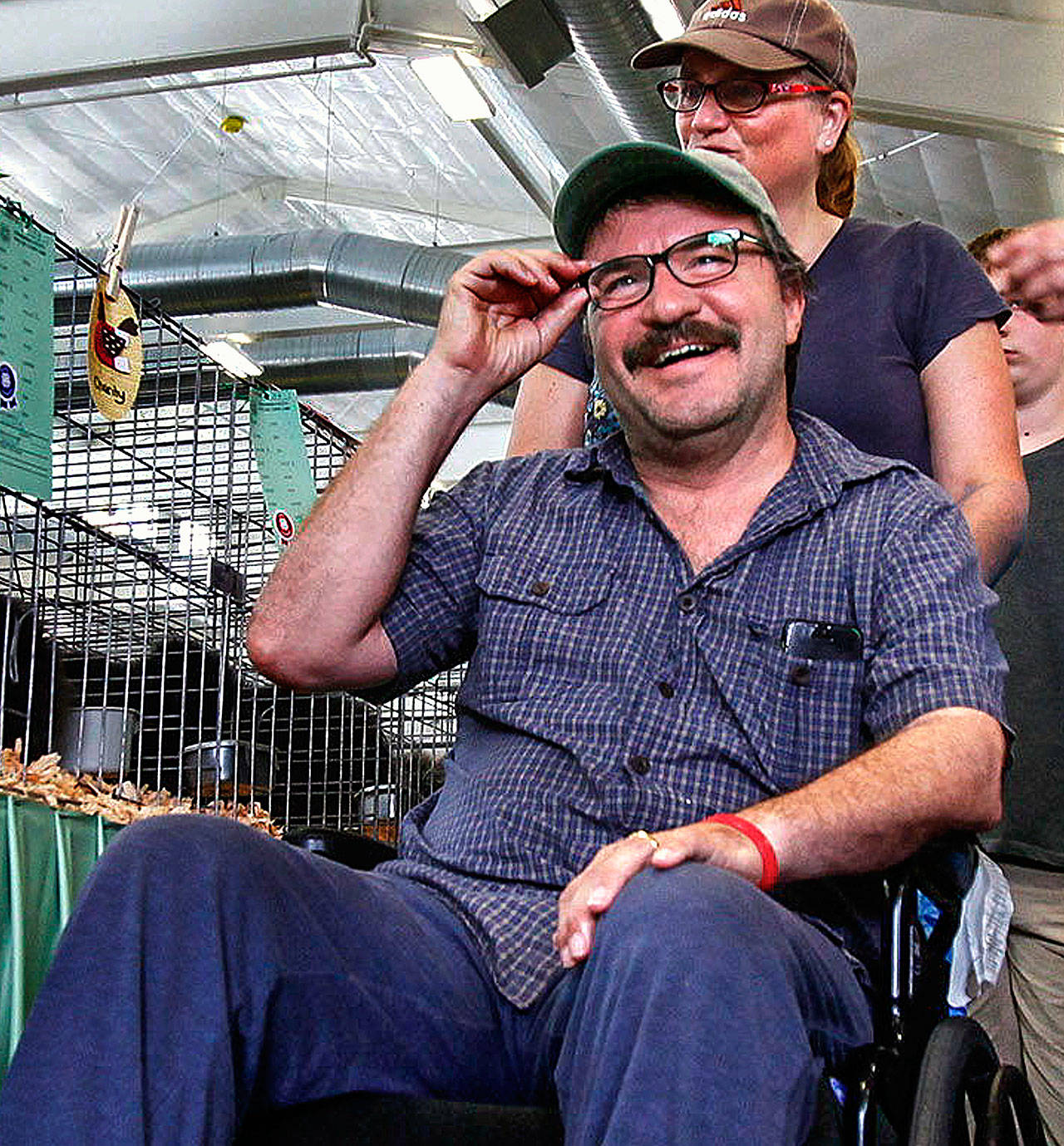 Jim and Marcia Hashman during a visit to the Evergreen State Fair in Monroe in 2014. Jim Hashman, who taught music at Mountlake Terrace High School in the 1980s and ’90s, died Jan. 31, after struggling with ALS for several years. (Herald file)