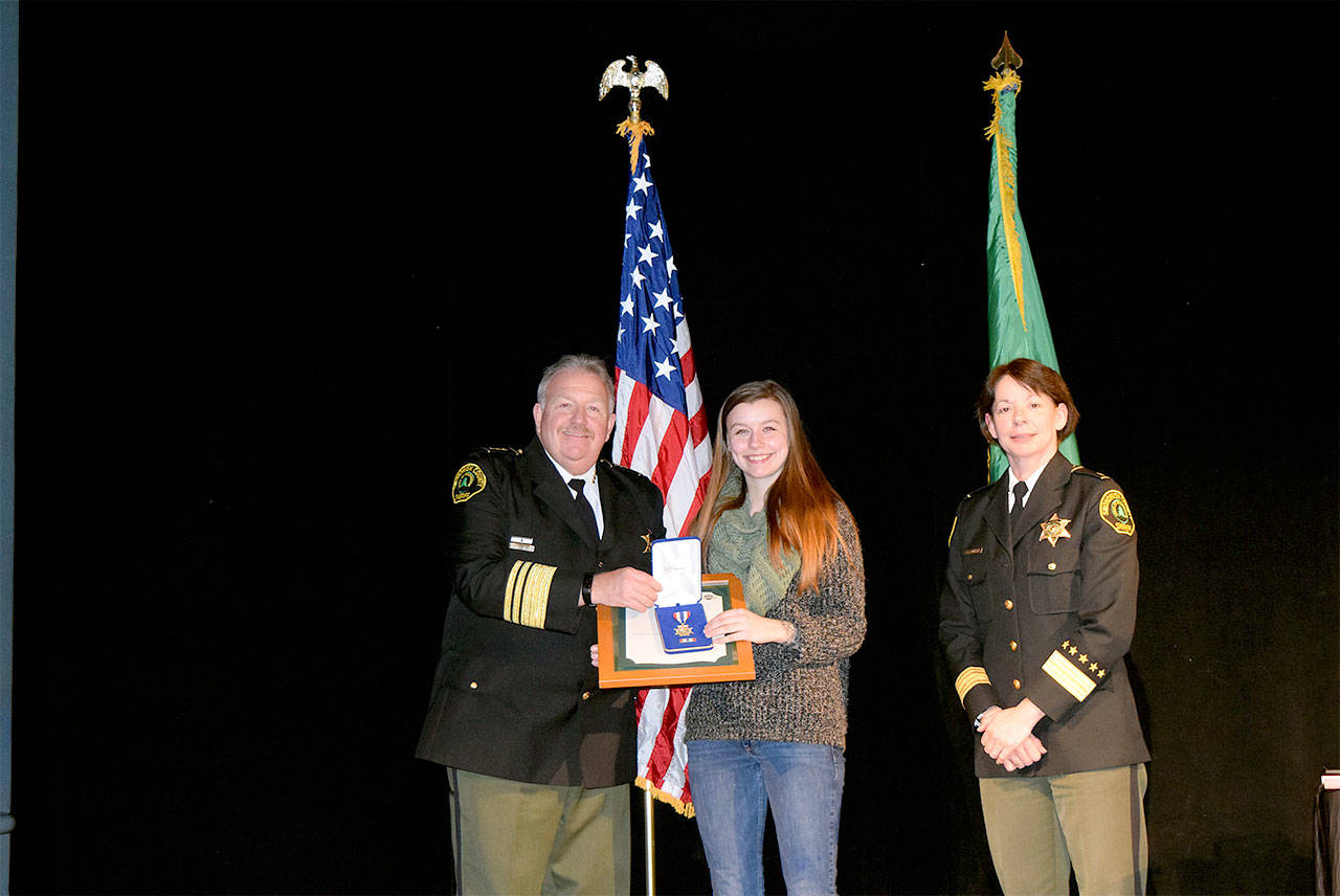 Explorer Emma Smith receives a Citizen Medal of Valor Award for stepping in front of a DUI driver to save the life of a citizen at the 2017 Snohomish County Sheriff’s Office Awards ceremony held March 6, 2018. (Contributed photo)