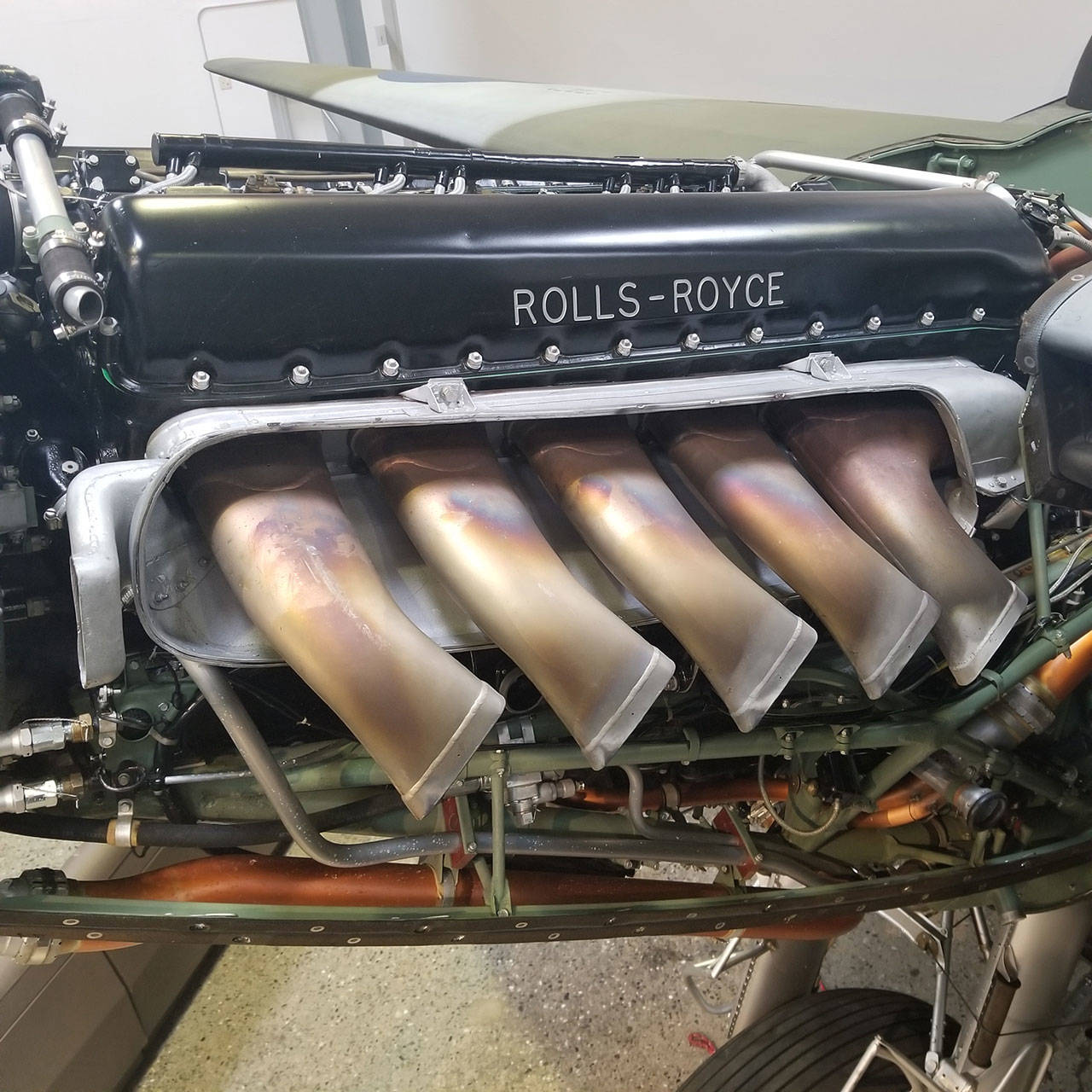 Why a V-12 engine plane has an odd number of exhaust stacks