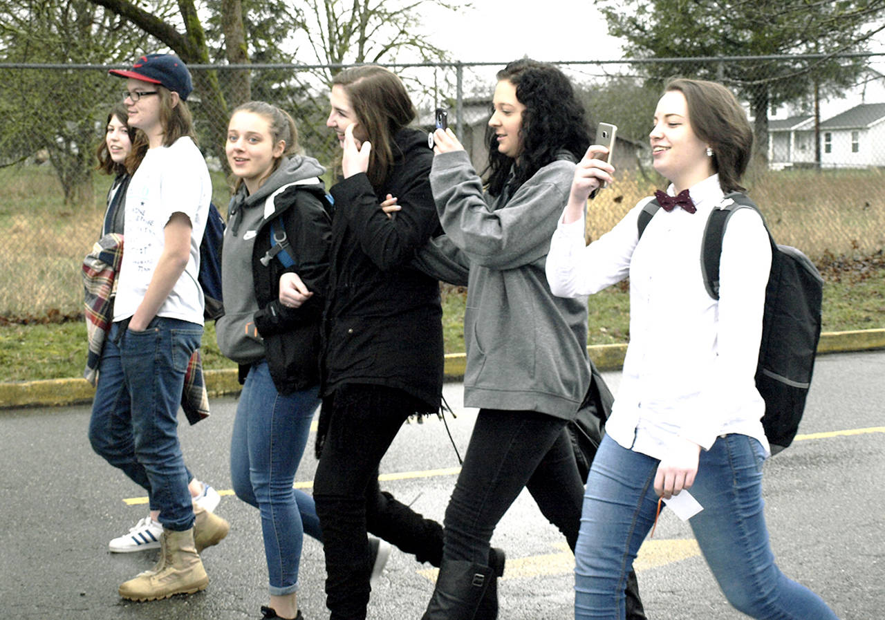 Students at Sultan High School took part in the national school walkout movement Wednesday. They aimed to share a message of love and kindness, they said. (Kaylee Spencer)