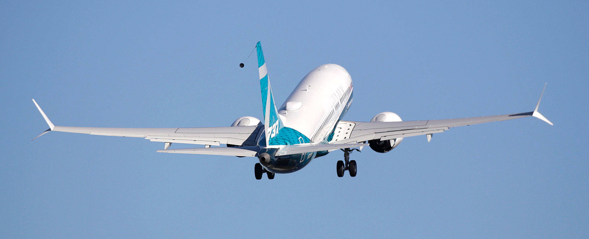 A Boeing 737 MAX 7 takes off on the model’s first flight on Friday in Renton. (AP Photo/Jason Redmond)