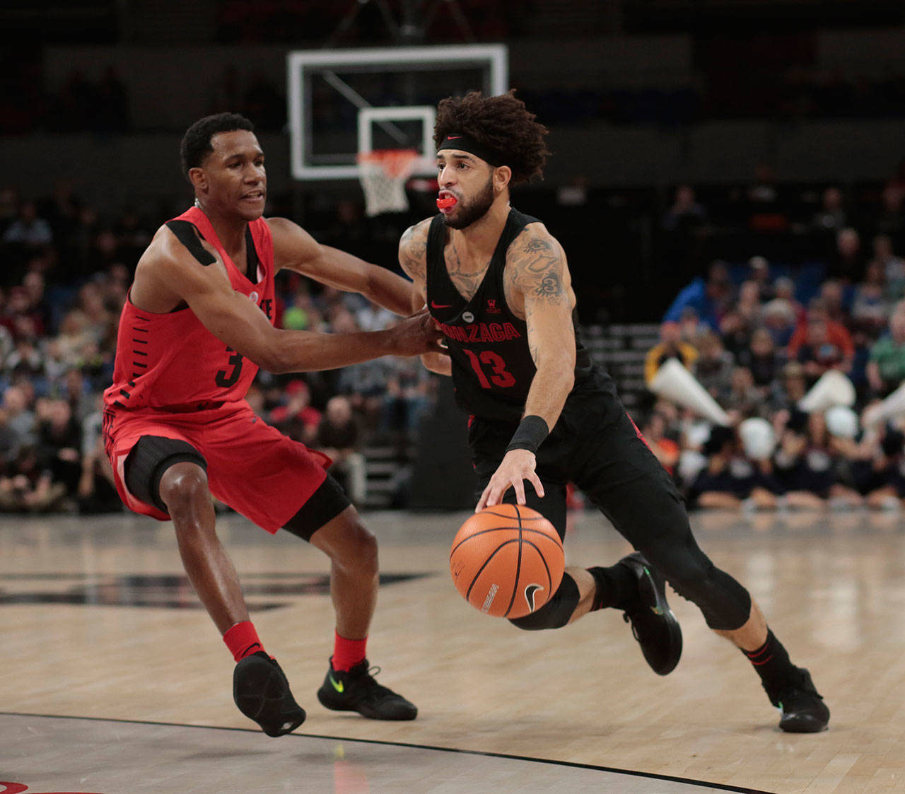 Ohio State’s C.J. Jackson (3) guards Gonzaga’s Josh Perkins (13) during the first half of a game in the Phil Knight Invitational tournament on Nov. 23, 2017, in Portland, Ore. (AP Photo/Timothy J. Gonzalez)