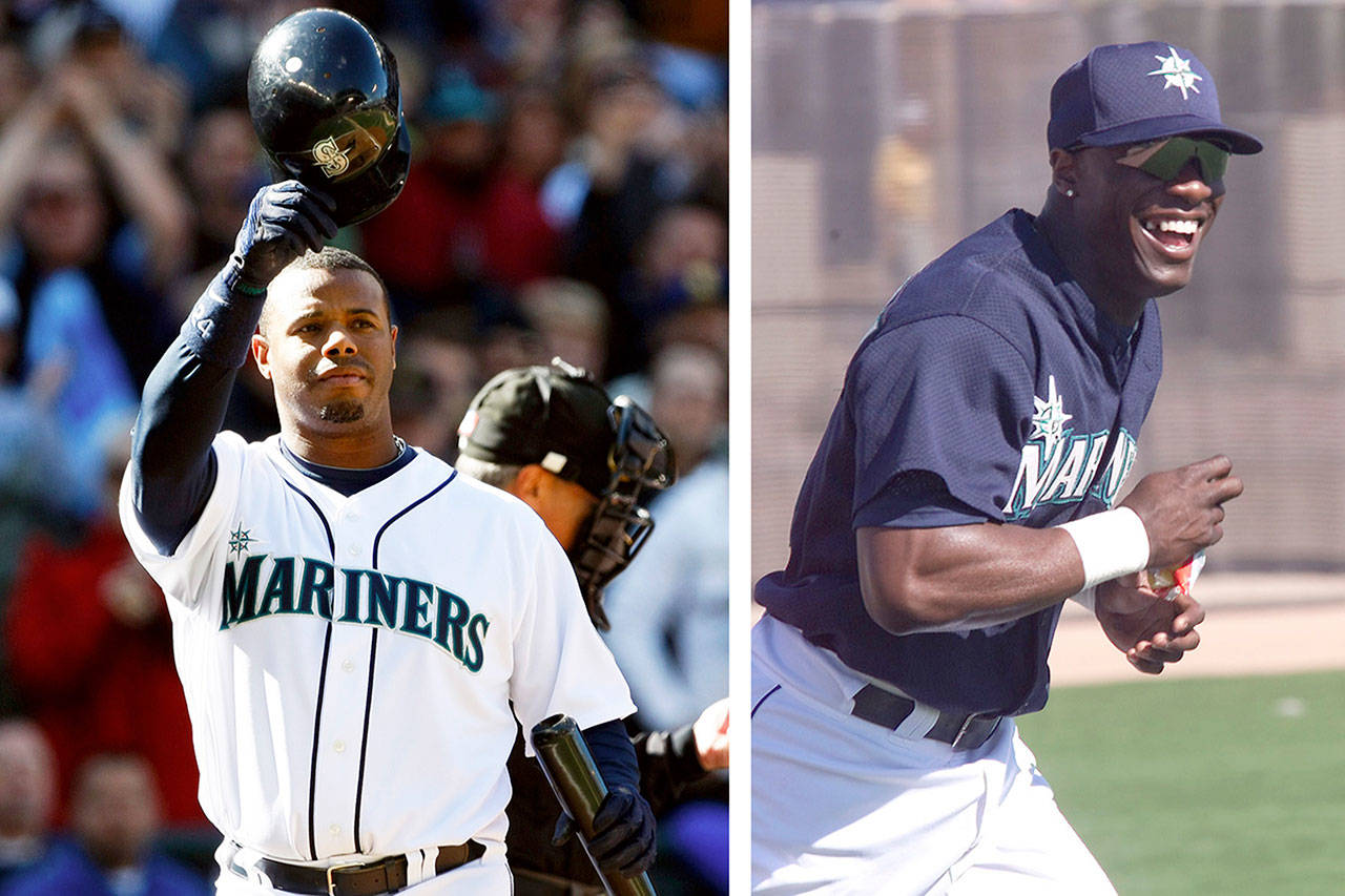 Ken Griffey Jr. (left) and Mike Cameron.