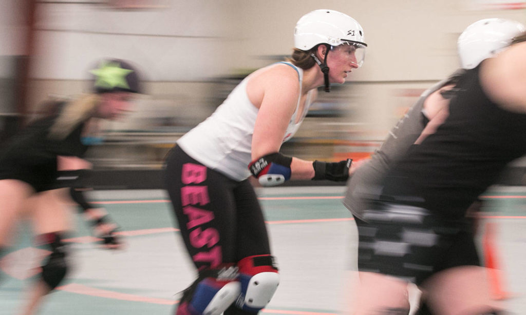 Lacey Ramon races through laps Sunday afternoon during practice at Rat’s Nest in Shoreline on March 18, 2018. (Kevin Clark / The Daily Herald)
