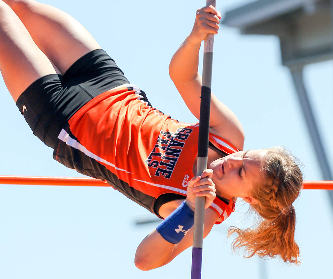 Kelsey Bassett of Granite Falls competes in the pole vault at the 2017 Class 2A state track and field championships in Tacoma last May. Bassett finished second in the event. (Kevin Clark / The Herald)                                Kelsey Bassett of Granite Falls competes in the pole vault at the 2017 Class 2A state track and field championships last May in Tacoma. Bassett finished second in the event. (Kevin Clark / The Herald)