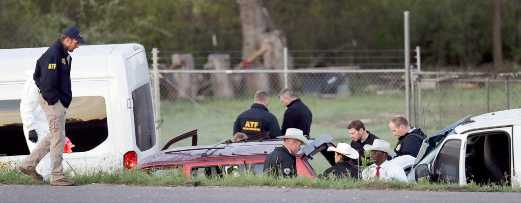 Officials investigate the scene where a suspect in a series of bombing attacks in Austin blew himself up as authorities closed in on Wednesday in Round Rock, Texas. (AP Photo/Eric Gay) 
