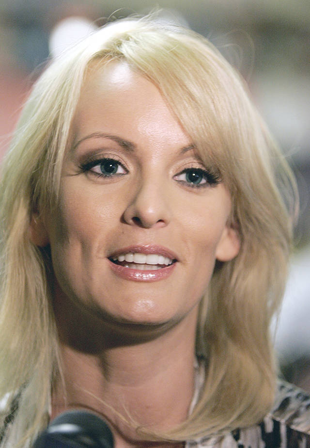 In this 2009 photo, Stormy Daniels visits a local restaurant in downtown New Orleans. (AP Photo/Bill Haber, File)