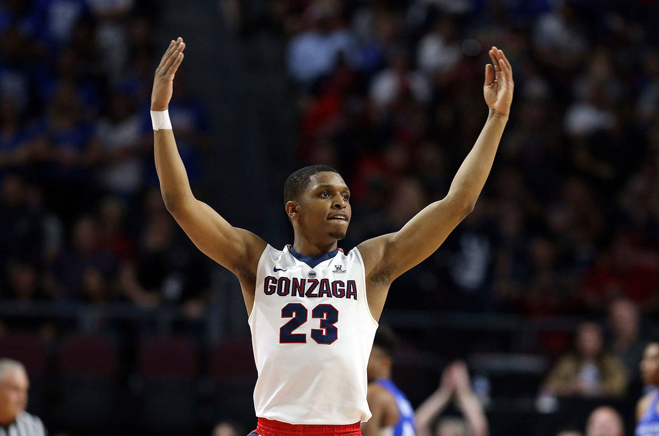 Gonzaga’s Zach Norvell Jr. raises his hands to the crowd during the first half of the West Coast Conference tournament championship against BYU on March 6, 2018, in Las Vegas. Norvell has provided Gonzaga with fiery spark on the way to the Sweet 16. (AP Photo/Isaac Brekken)