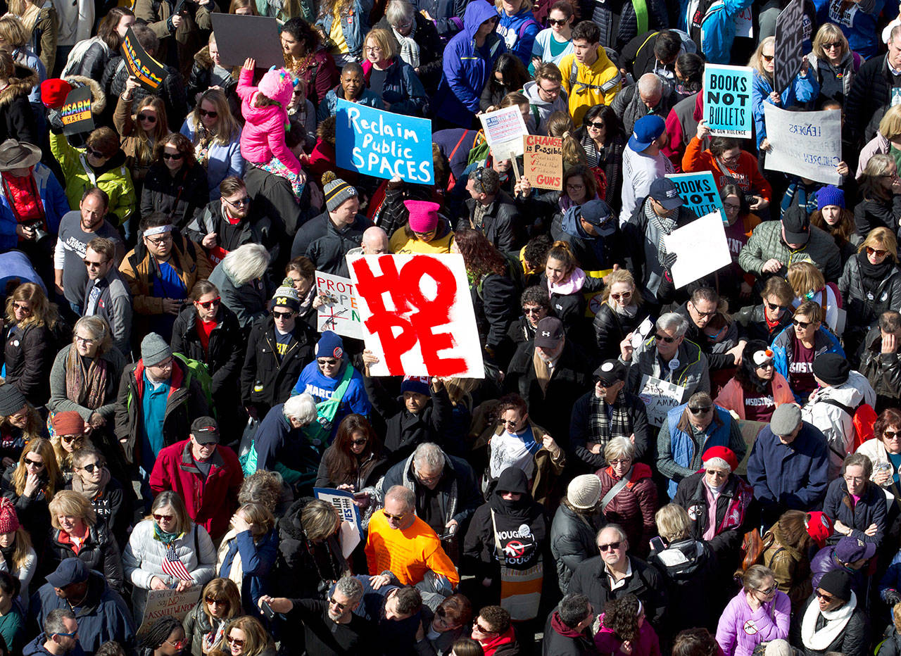 Protesters march along Pennsylvania Avenue, as seen from the Newseum, during the March for Our Lives rally in support of gun control in Washington, D.C., Saturday. (Jose Luis Magana/Associated Press)