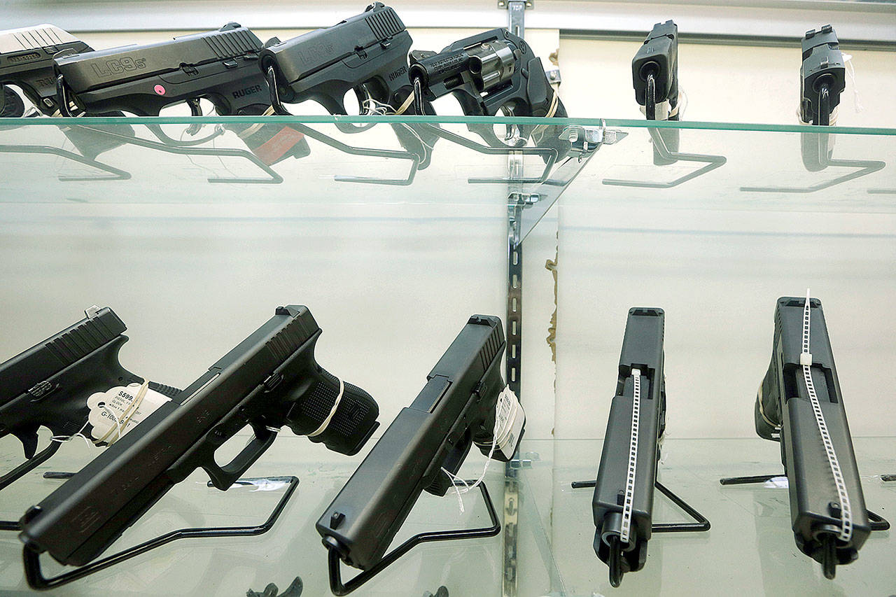 Guns on display at a store in Miami. (AP Photo/Alan Diaz, File)