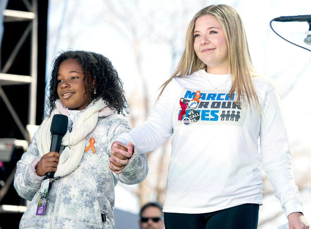 Yolanda Renee King (left), granddaughter of Martin Luther King Jr., with Jaclyn Corin, a student at Marjory Stoneman Douglas High School in Parkland, Florida, and one of the organizers, speaks during the March for Our Lives rally in support of gun control in Washington on Saturday. (AP Photo/Andrew Harnik) 
