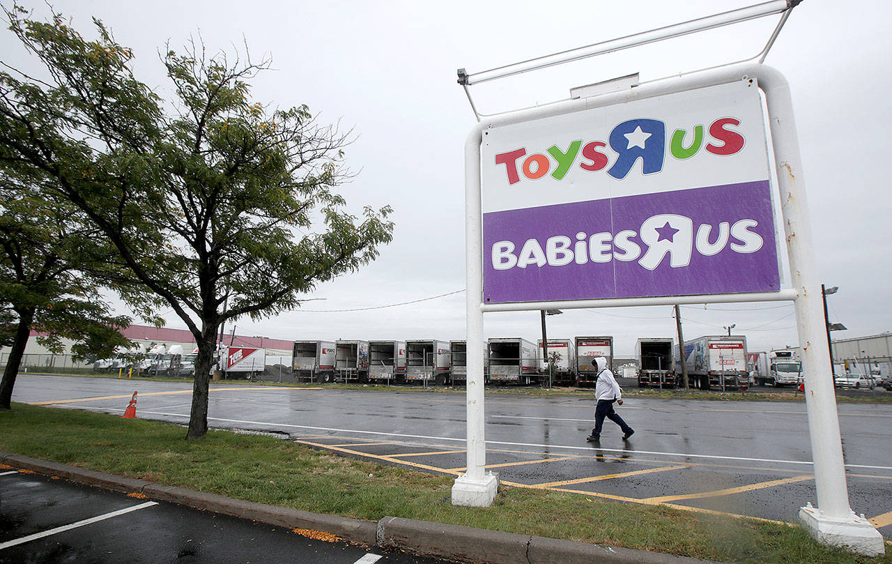 Toys R Us and Babies R Us stores are closing, leaving the Toys for Tots charity in a tough spot. (AP Photo/Julio Cortez)