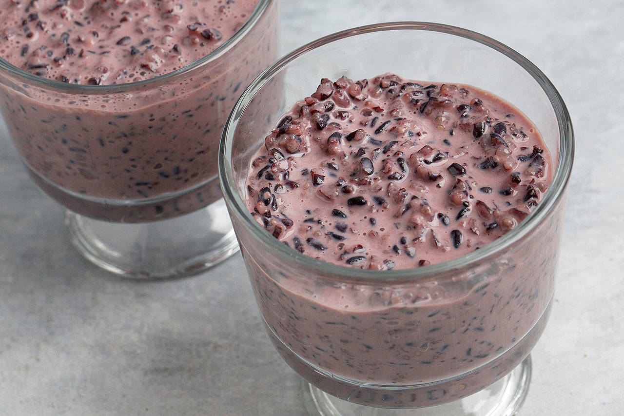 Black rice pudding is thickened with a scoop of chia seed. (Photo by Deb Lindsey for The Washington Post)